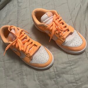 NIKE Women’s peach and cream low dunks